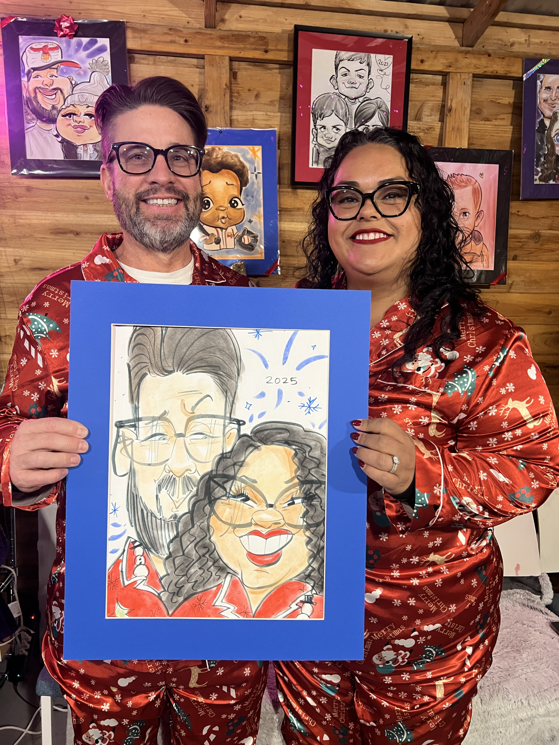 Couple presenting a custom Christmas caricature